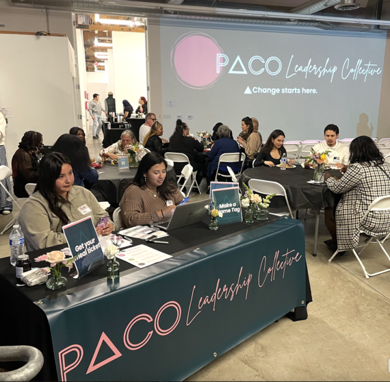PACO Leadership Collective event with attendees networking at tables.