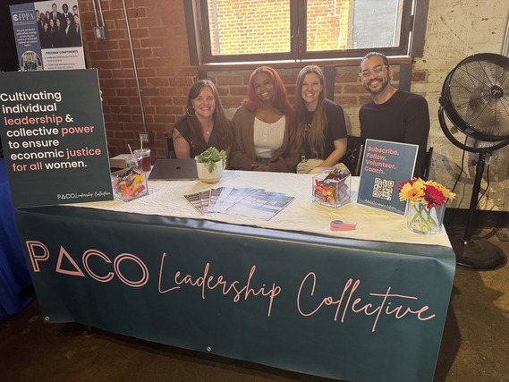 PACO Leadership Collective table with 4 smiling people at a March 2026 event.