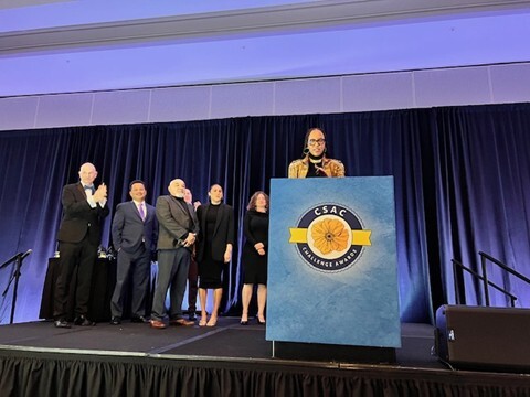 CSAC Challenge Awards ceremony with presenters on stage.